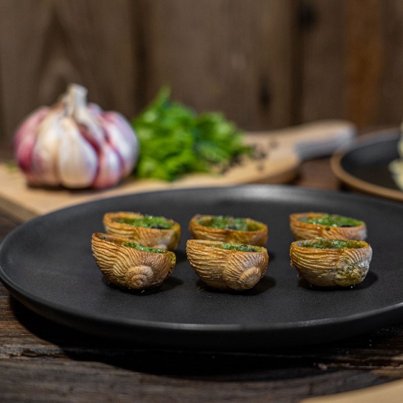 Escargots présentés dans une cRoquille - Recette à la bourguignonne - Nos produits frais